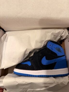 Nike Air Jordan 1 Mid in Black and Royal Blue